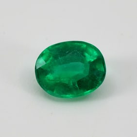 Loose Emerald, Tiger Eye, and Glass Bead