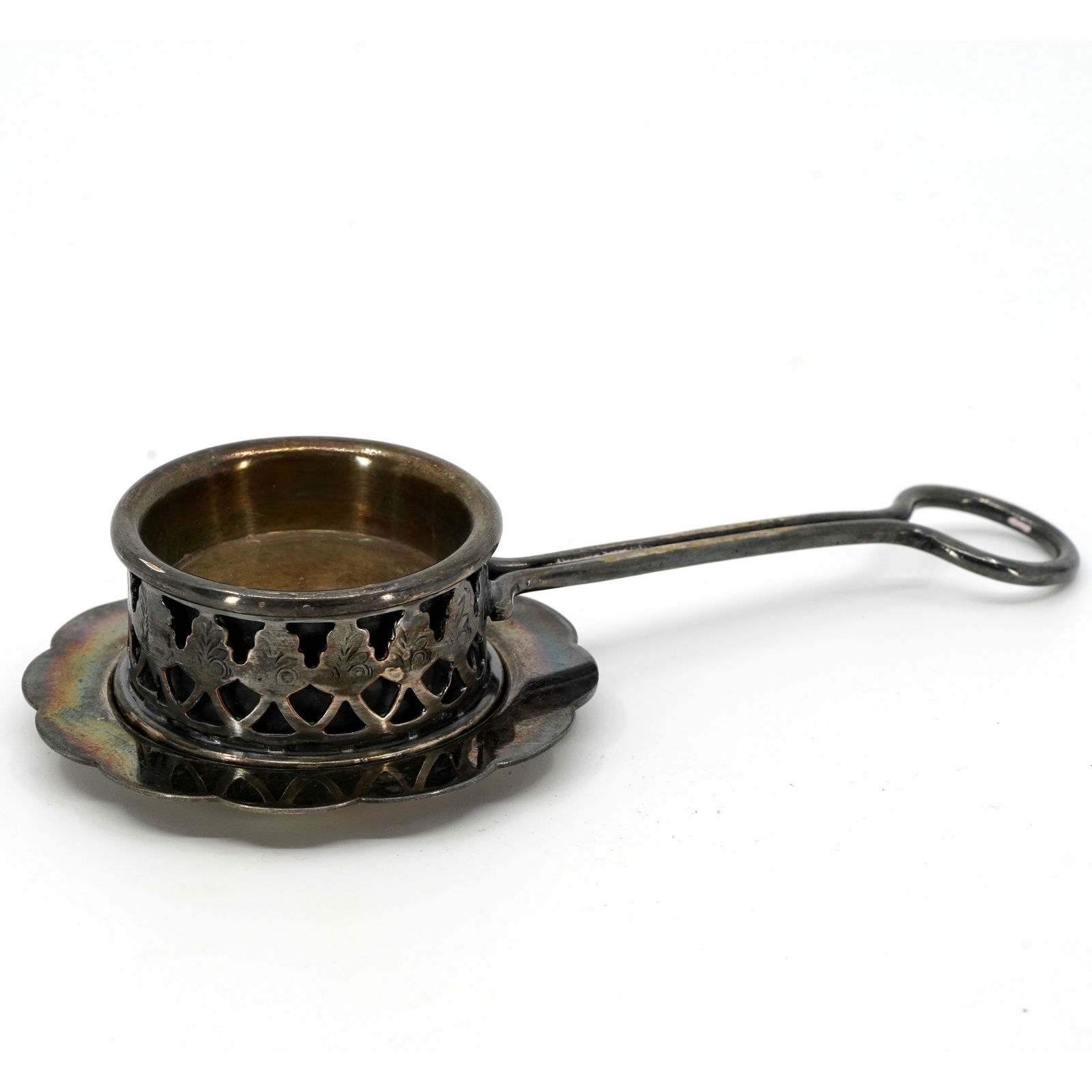 Ottoman Silver Frankincense Resin Burner: Ottoman silver frankincense resin burner. The burner has cedar tree designs around the body. 19th century. Dimensions: 4 1/4 x 3/4 x 1 1/2 inches.