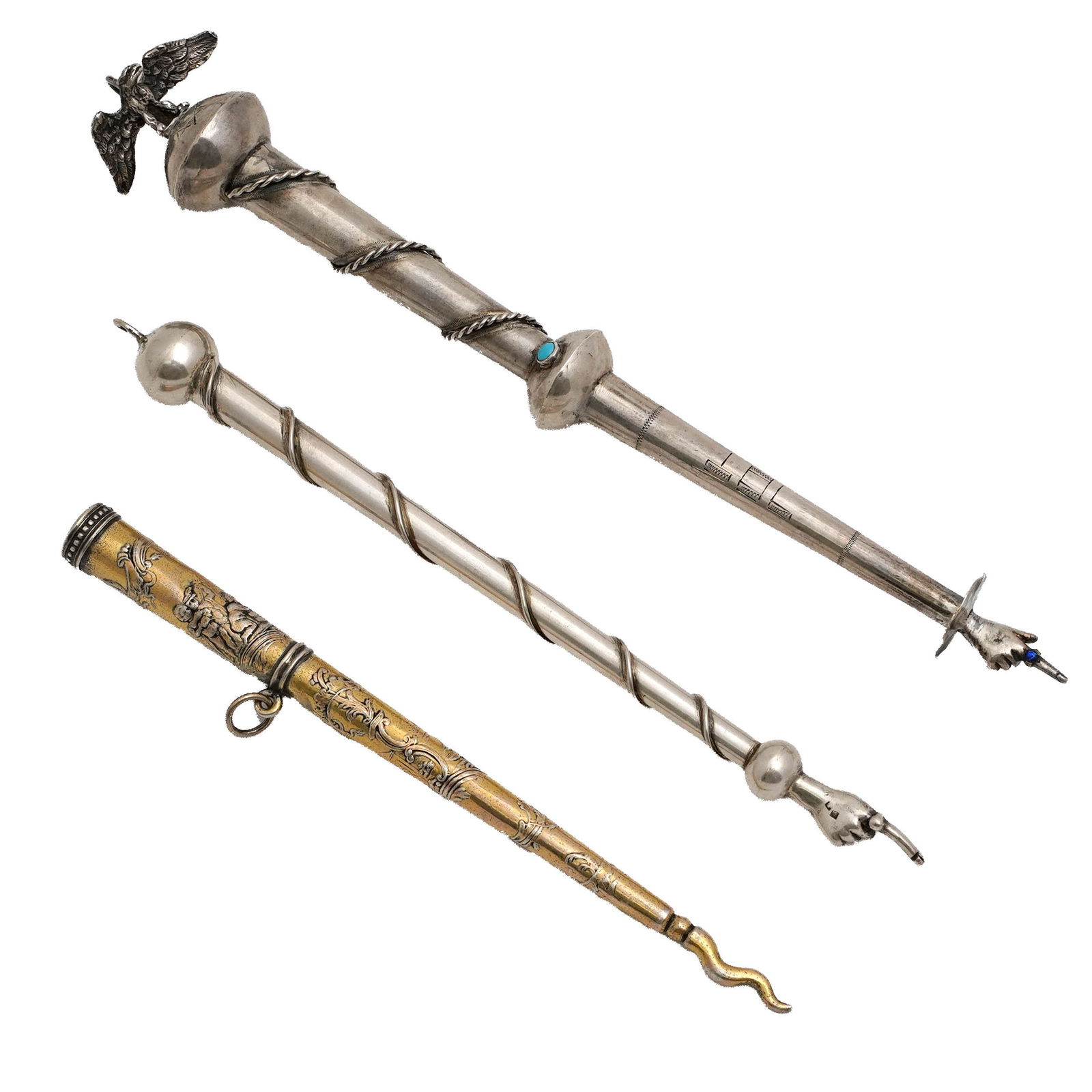 Lot of Three Marked Russian & Continental Silver Yads: Lot of three marked Russian and continental silver yads. The yads are adorned with spiral wrappings, chased designs, and jeweled embellishments. Both silver yads are stamped 84 silver, with one