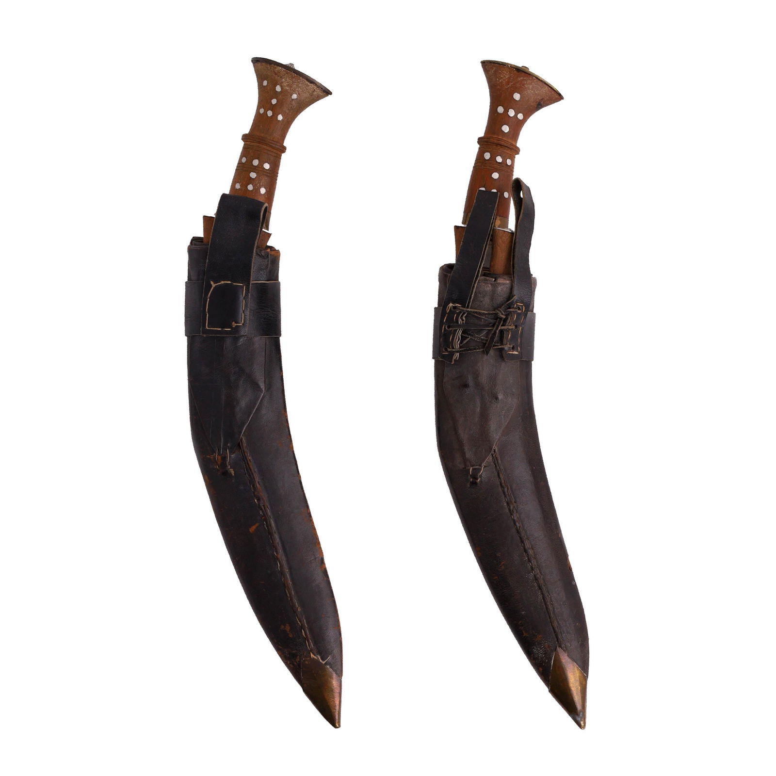 Two Nepalese Khukuri Daggers: Two Nepalese Khukuri daggers with inlaid wood handles. Length 17 1/2 inches.
