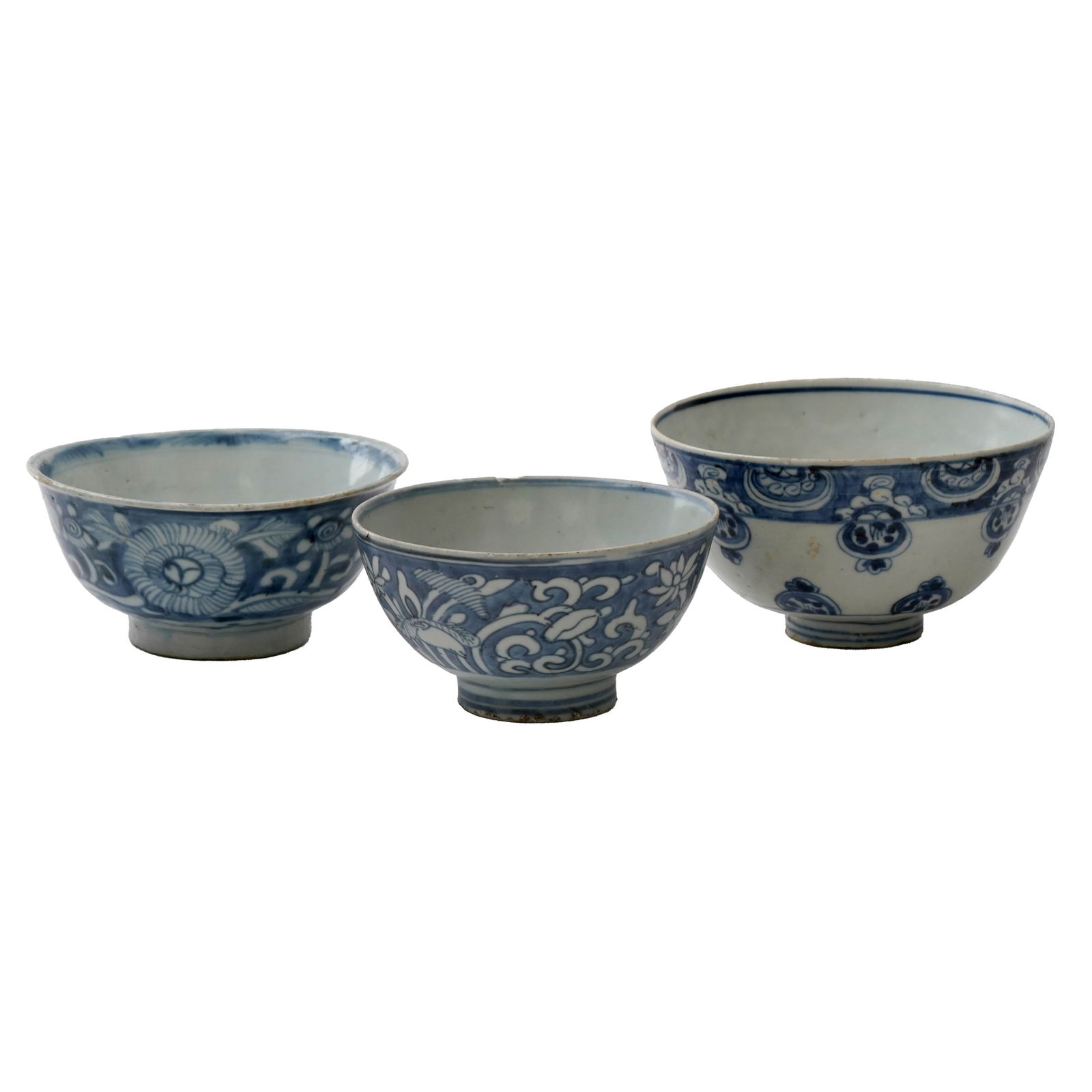 Lot of Three Chinese Blue and White Porcelain Bowls, No reserve: Lot of three Chinese blue and white porcelain bowls. The bowls are covered with traditional Chinese ornamental and natural motifs. Dimensions: 3 1/2 x 6 1/2 inches (largest bowl).