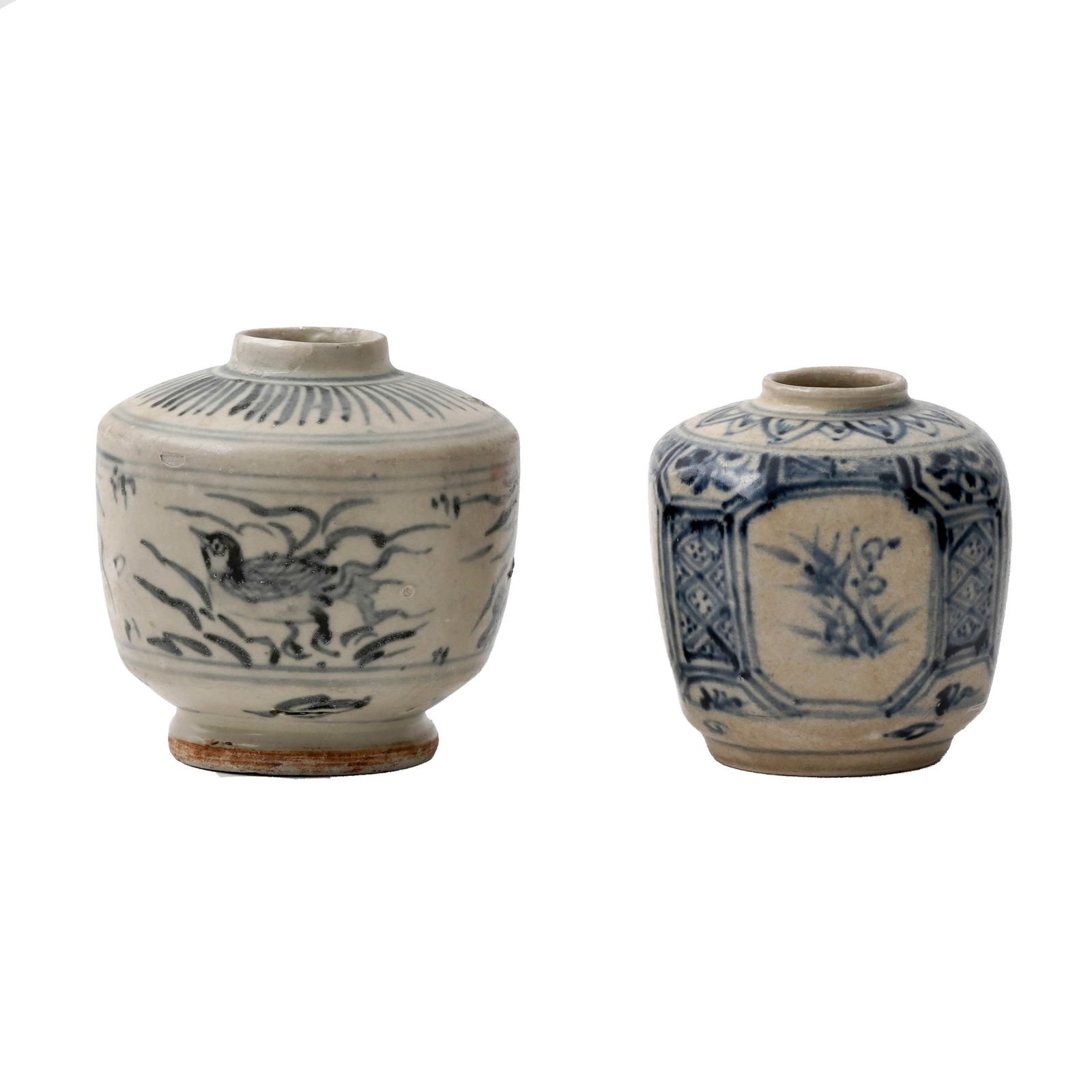 Lot of Two Vietnamese Ceramic Ink Pots: Lot of two Vietnamese ceramic ink pots. The two blue-and-white inkpots contrast: one is octagonal with geometric patterning, while the other shows fowl designs wrapping along its body. Dimensions: 3 1