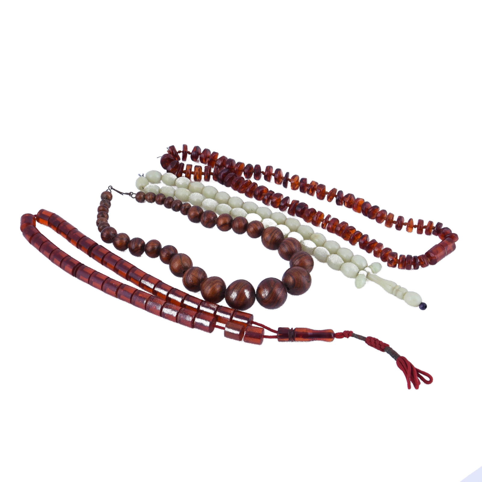 Mixed Lot of Five Middle Eastern Necklaces: Mixed lot of five Middle Eastern necklaces. One is silver while the others are beaded from various materials. Includes three sets of Islamic prayer beads. Dimensions: 34 inches (longest necklace).