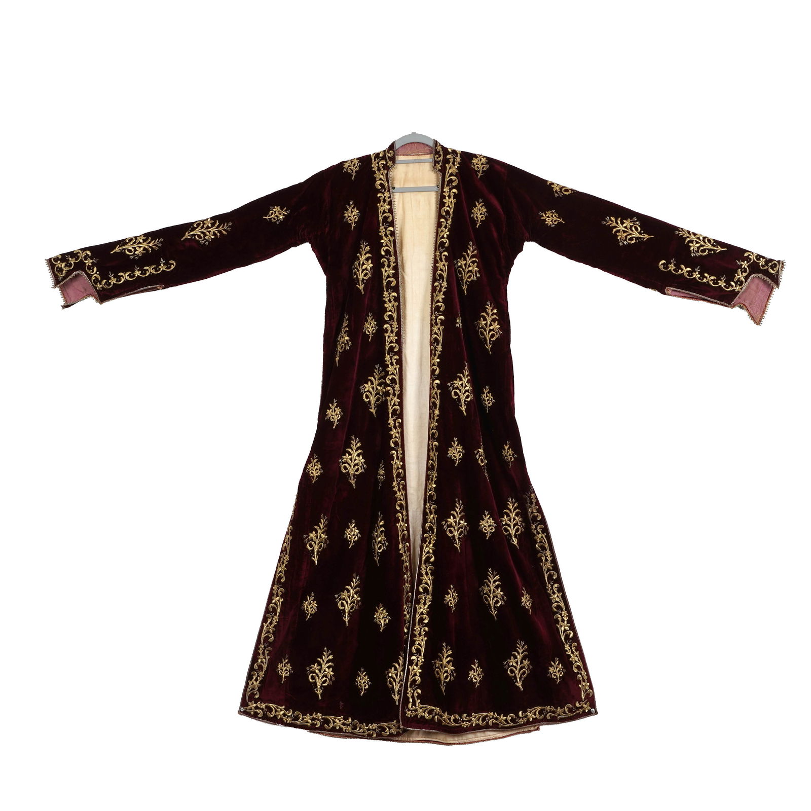 Ottoman Turkish Silk Velvet Robe with Gold Metallic Embroidery: Ottoman Turkish silk velvet robe with gold metallic embroidery. On a dark crimson ground, posy-like patterns and vine scroll are embroidery in gold metallic thread. Dimensions: 54 x 18 inches (length