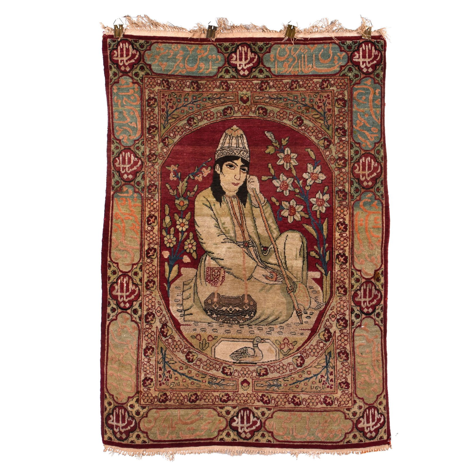 Signed Persian Lavar-Kerman Wool Pictorial Rug: Signed Persian Lavar-Kerman wool pictorial rug. The rug appears to depict the Sufist leader Nur Ali Shah (d 1801). Bordering the rug are alternating cartouches with Persian script. Dimensions: 37 x