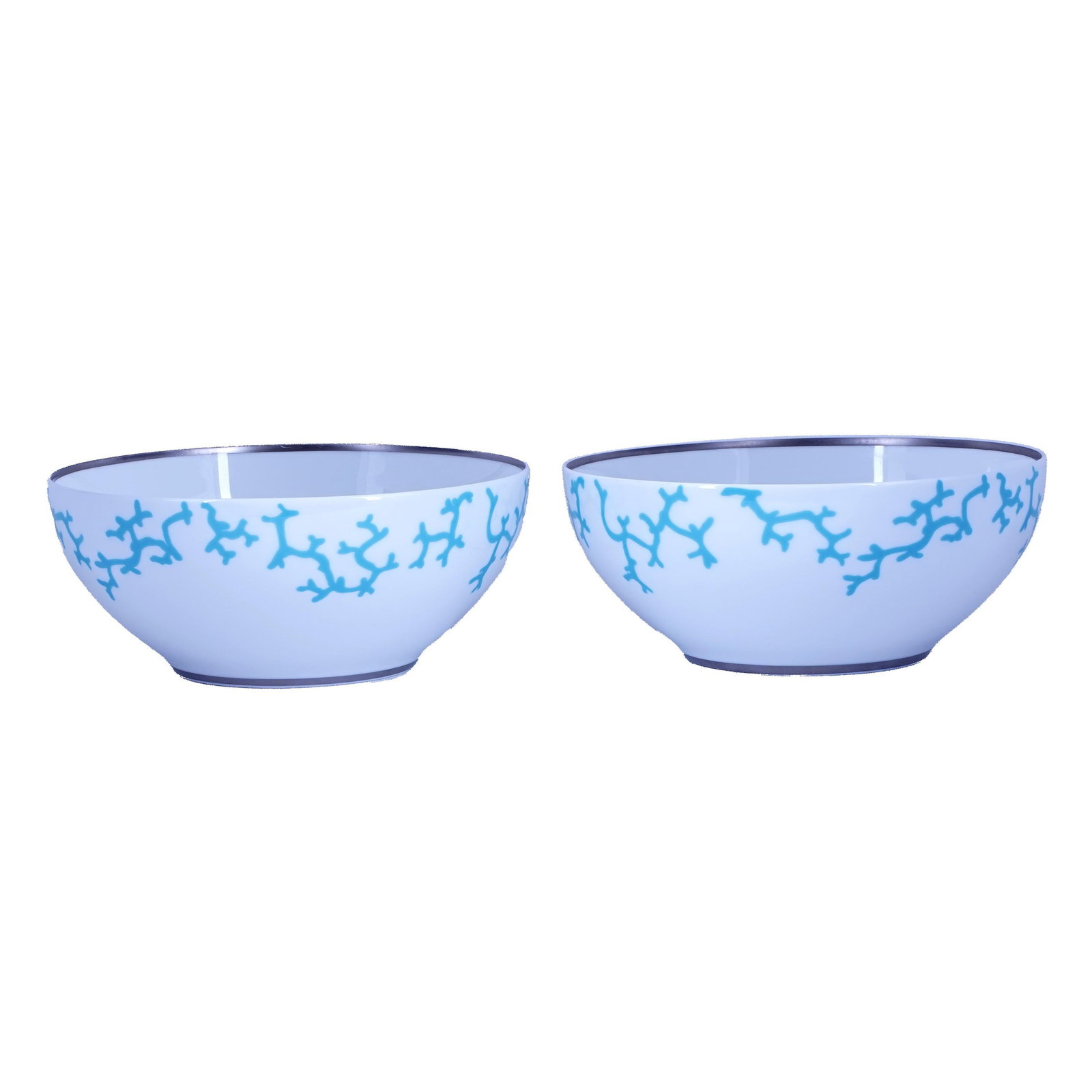 Pair of Raynaud Limoges “Cristobal" Serving Bowls: Pair of Raynaud Limoges porcelain serving bowls in the “Cristobal” pattern designed by Alberto Pinto, each with white ground, turquoise coral-form decoration around the exterior, and black rim