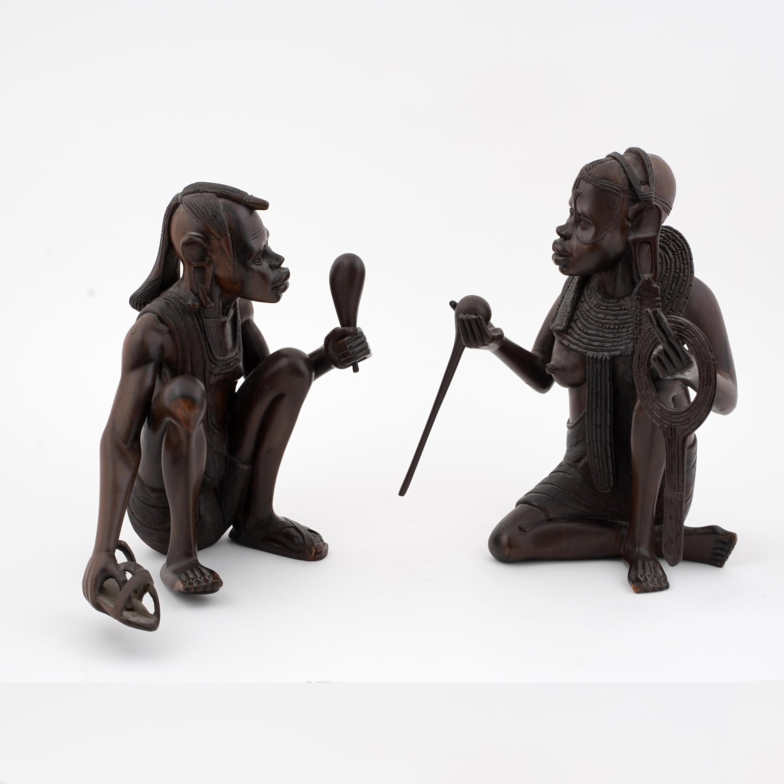 Pair of African Carved Wood Seated Figures (1 of 3)
