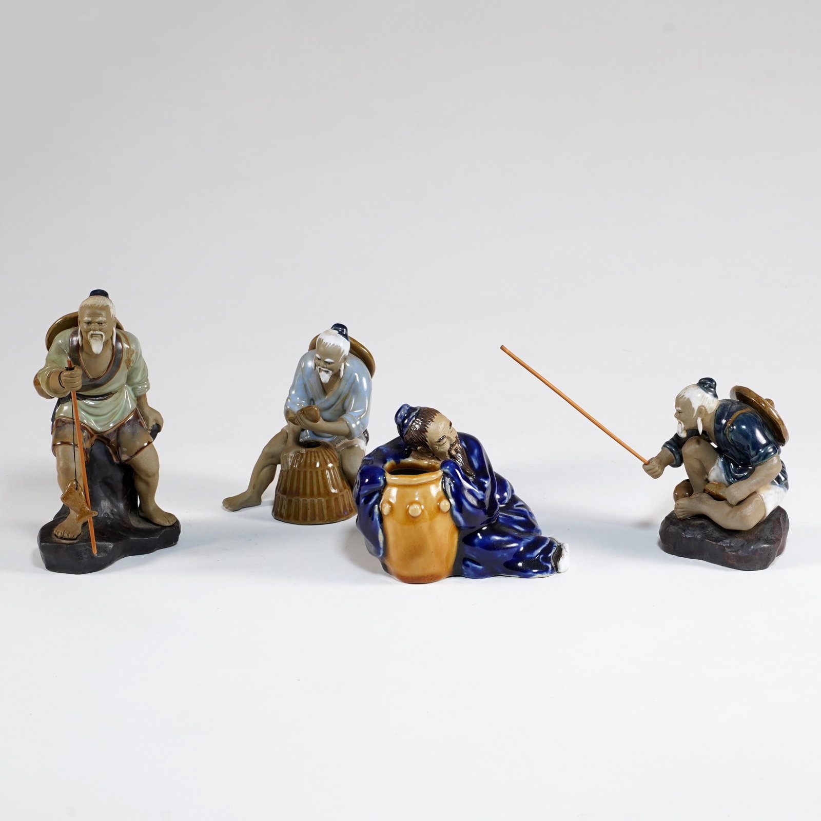 Group of Japanese Glazed Ceramic Fisherman Figures (1 of 3)