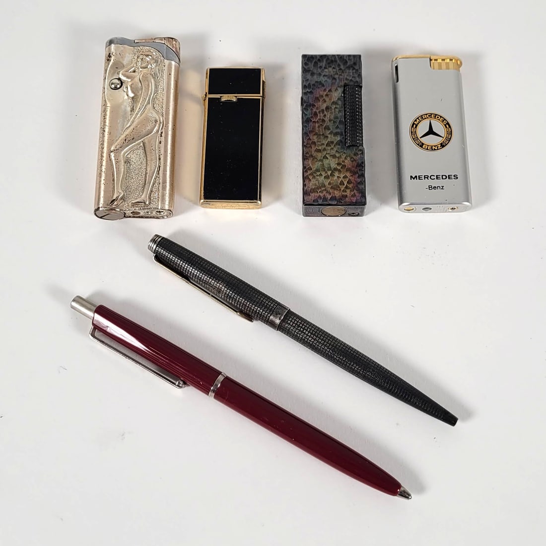 Assorted Lighters and Pens (1 of 2)