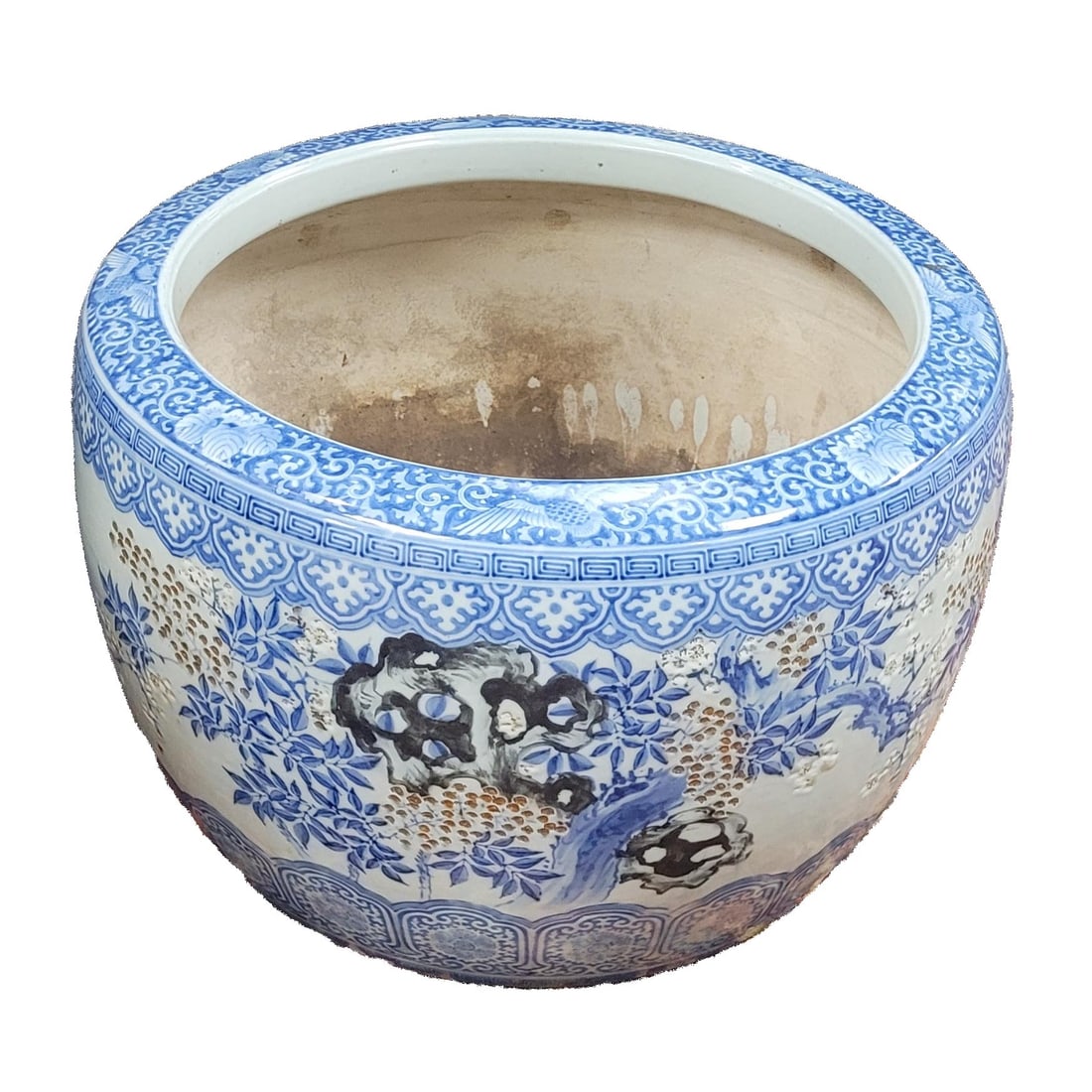 Large Chinese Blue and White Porcelain Fish Bowl / Jardinière: Large Chinese blue and white porcelain fish bowl/jardinière, 20th century, decorated with bamboo, rockwork, and floral motifs beneath a patterned rim border, rounded form with open top, used as a pla