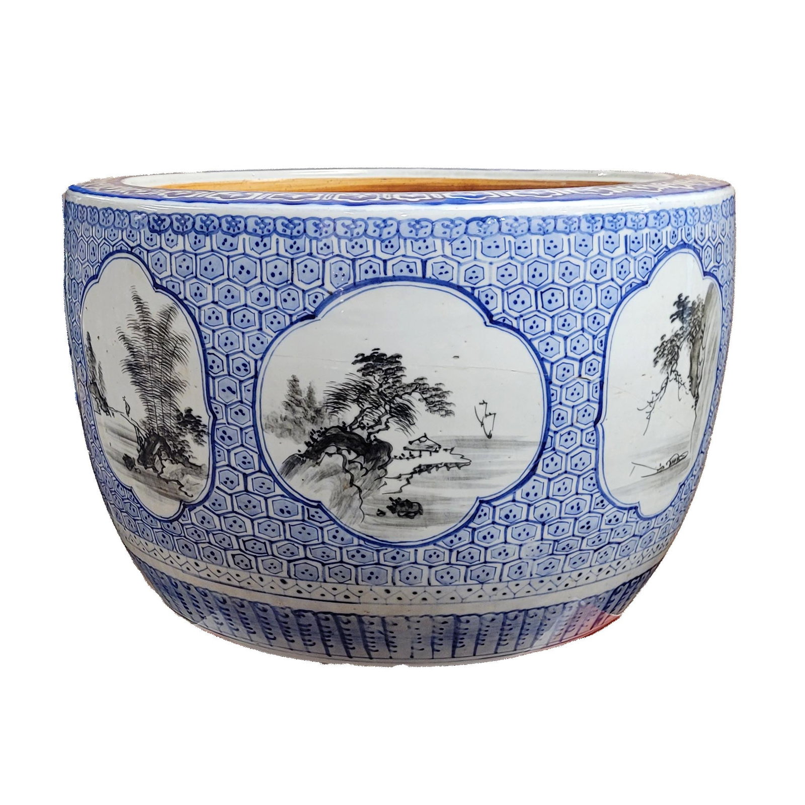 Large Chinese Blue and White Porcelain Fish Bowl / Jardinière: Large Chinese blue and white porcelain fish bowl/jardinière, 20th century, decorated with bamboo, rockwork, and floral motifs beneath a patterned rim border, rounded form with open top, used as a pla