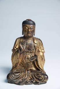 BUDDHA: wood cared and restgilded, South-China, 18th century H: 16 cm