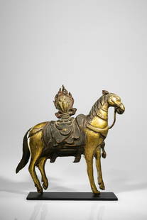 THRONE FRAGMENT IN SHAPE OF A HORSE: Gilt copper repousse China / Tibet , 18th century Dimensions: Height 25 cm Wide 24 cm Depth 4 cm Weight: 313 grams without base A copper fragment of a horse with ornamental saddlery and bridles.