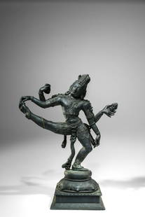 SHIVA IN YOGI POSITION: Bronze India , 18th century Dimensions: Height 41 cm Wide 31 cm Depth 15 cm Weight: 5897 grams Shiva is standing on a lotus podest attached to an expansive square podest. He is performing one