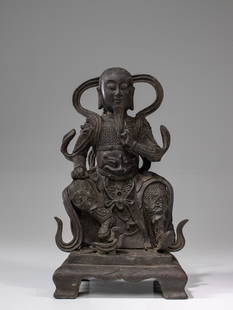 GUANDI | GOD OF WAR: Bronze China , Ming Dynasty ( 1368 - 1644 ) Dimension: Height 27 cm Wide 15 cm Depth 11 cm Weight: 2780 grams Seated on a throne with four feet, one leg supported on a mystical creature. He is dressed