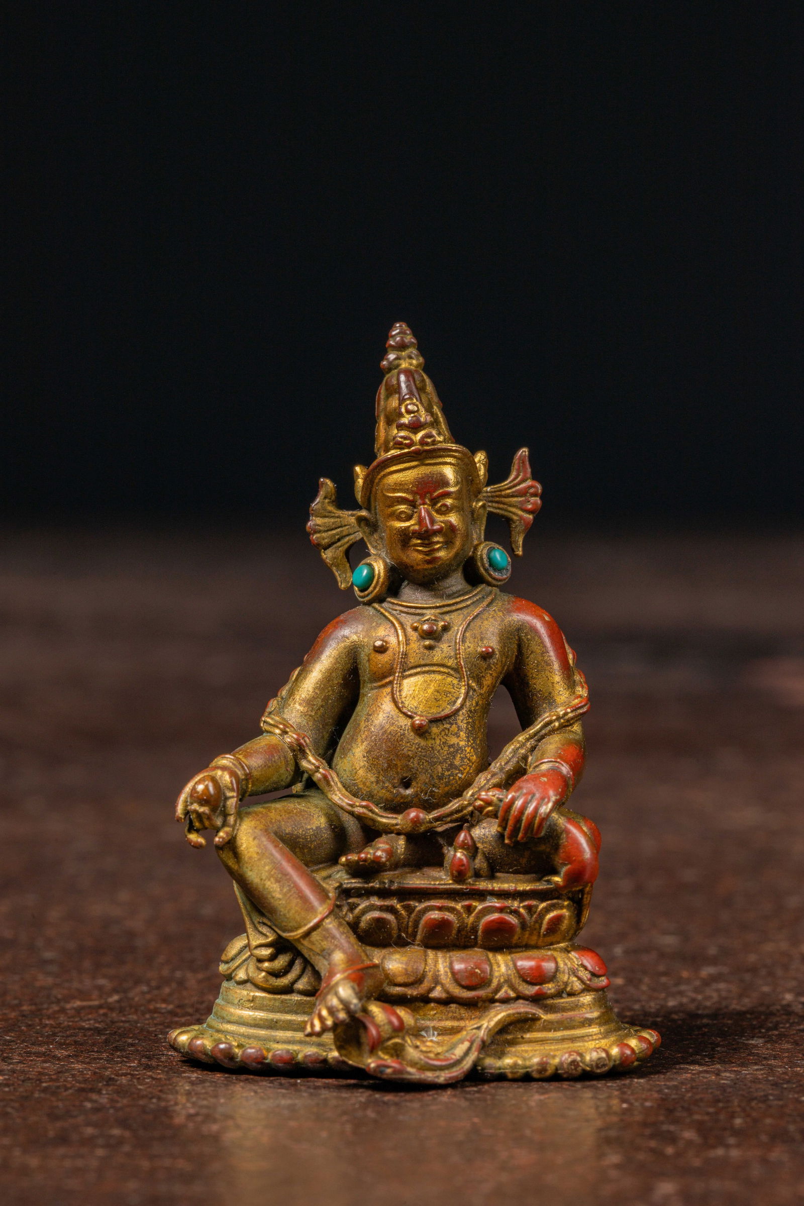 A SEATED BRONZE GILT JAMBHALA TIBET 13TH CENTURY STYLE BUT LATER (1 of 6)