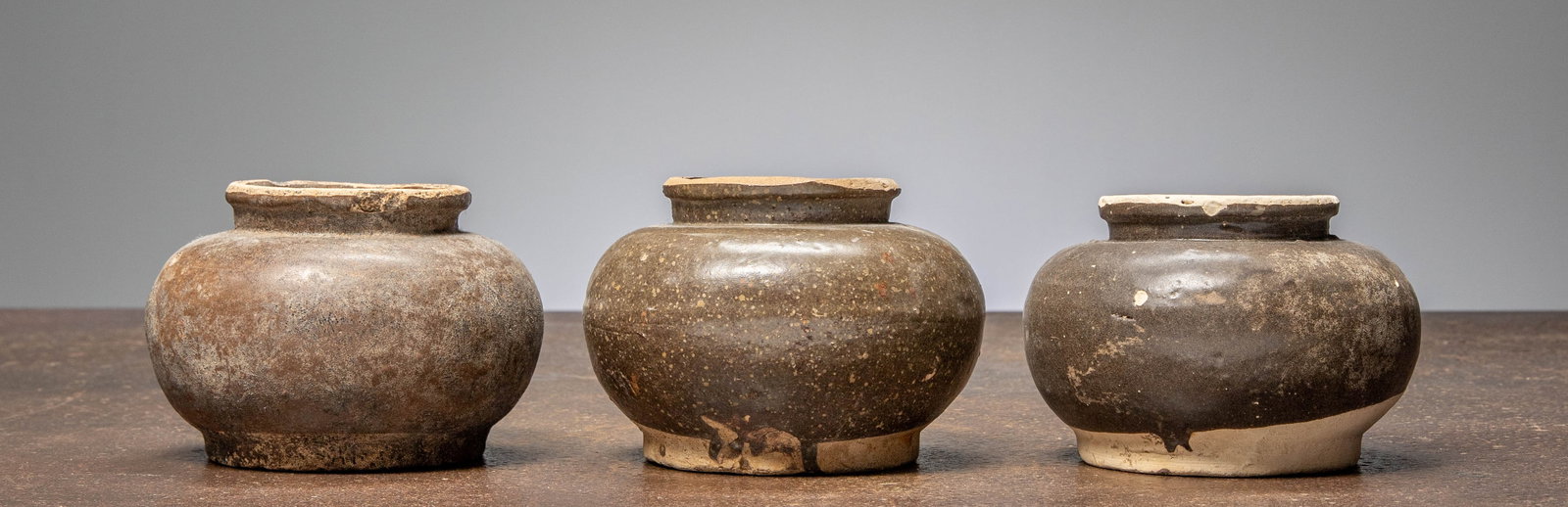 (R) THREE CHINESE STOENWARE STORAGE JARS, MING DYNASTY, 14TH - 17TH CENTURY (1 of 1)