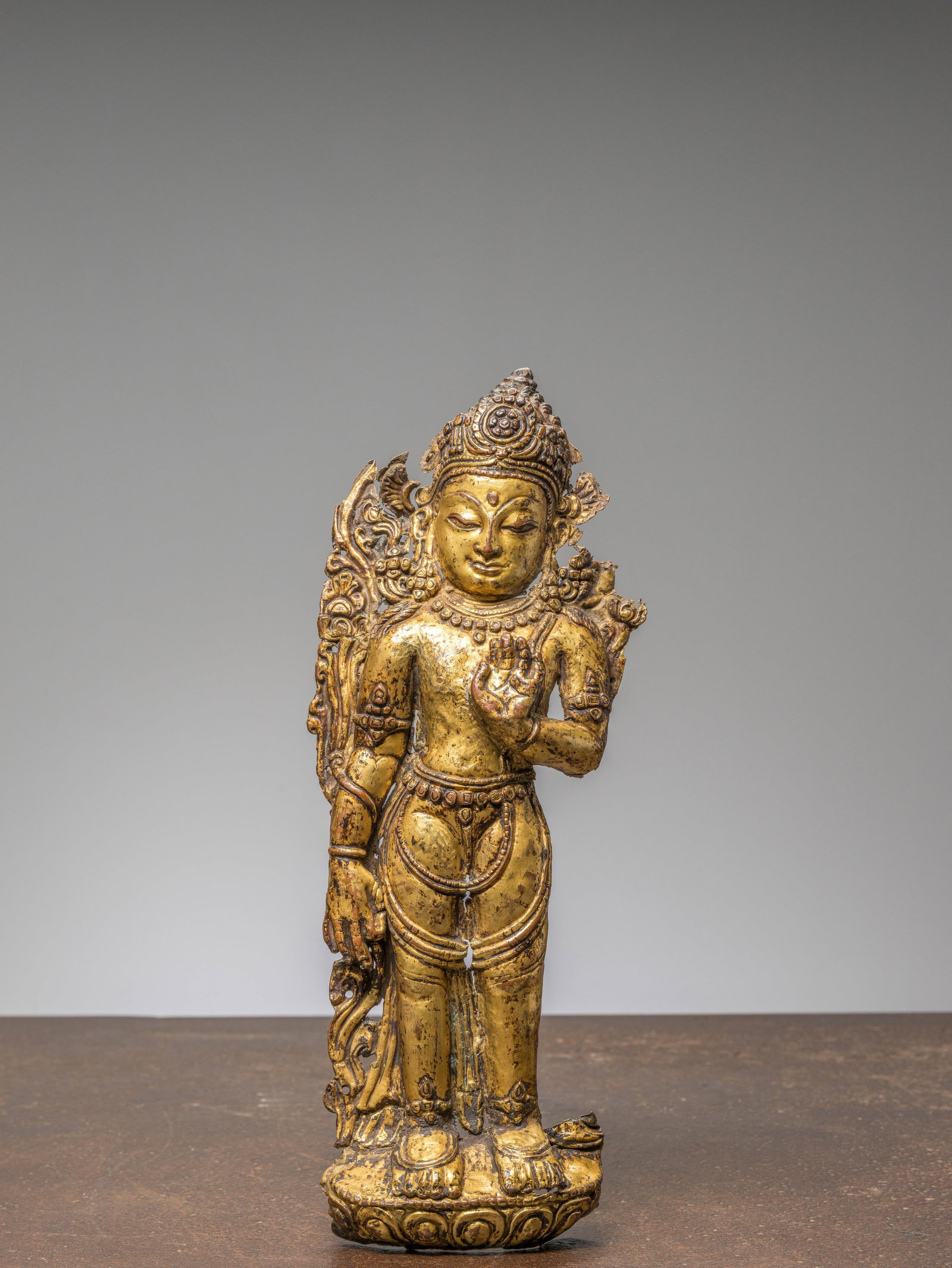 A STANDING PADMAPANI, COPPER REPOUSSE FIREGILT, TIBET, 17TH CENTURY (1 of 5)