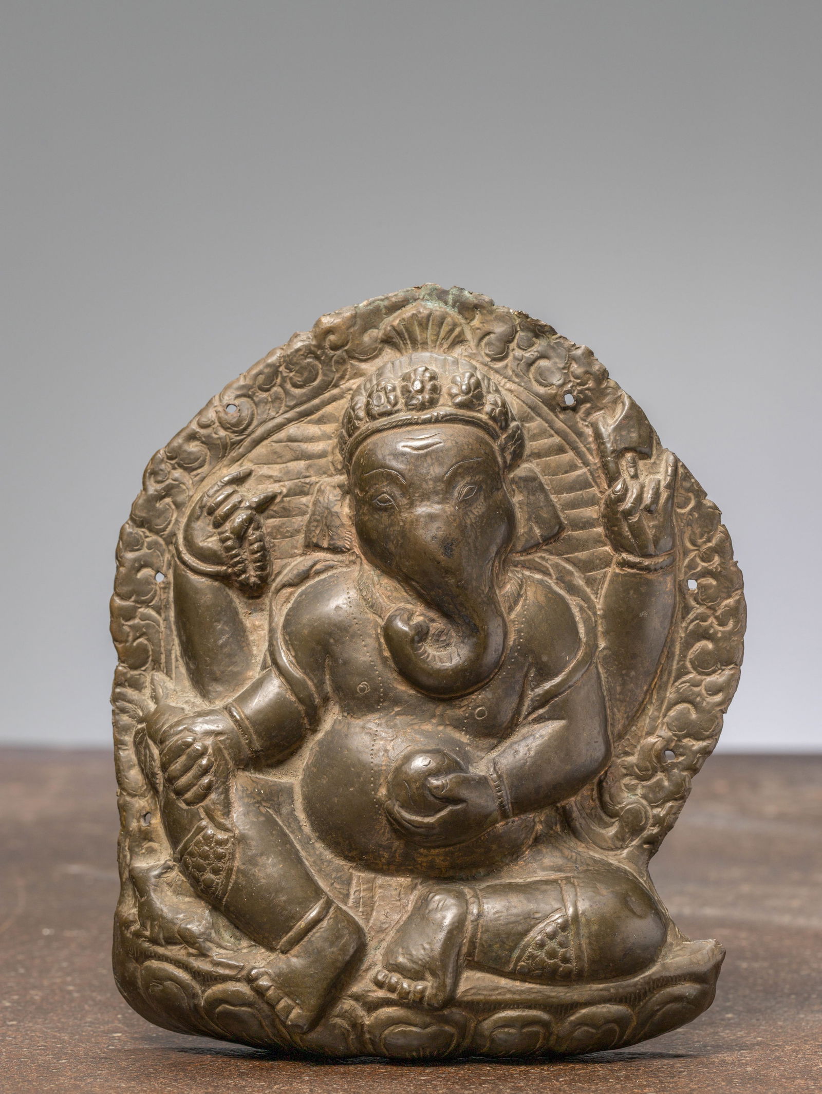 A COPPER REPOUSSE GANESHA, NEPAL, 18TH CENTURY (1 of 3)