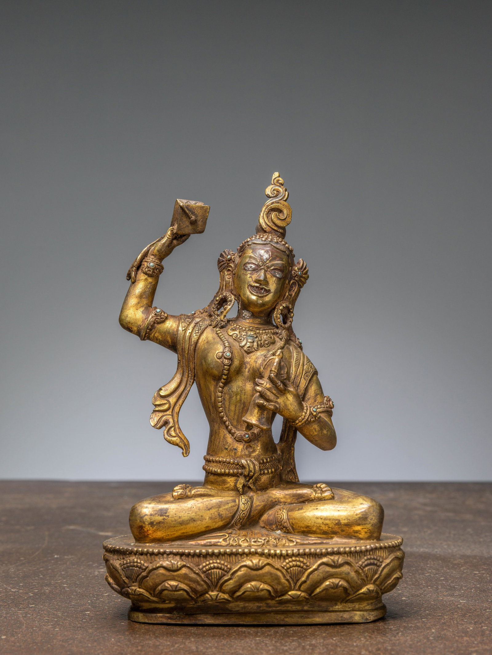 A TIBETAN GILT BRONZE OF MACHIG LABDRON, 18TH CENTURY, WITH SILVER INLAYS (1 of 6)