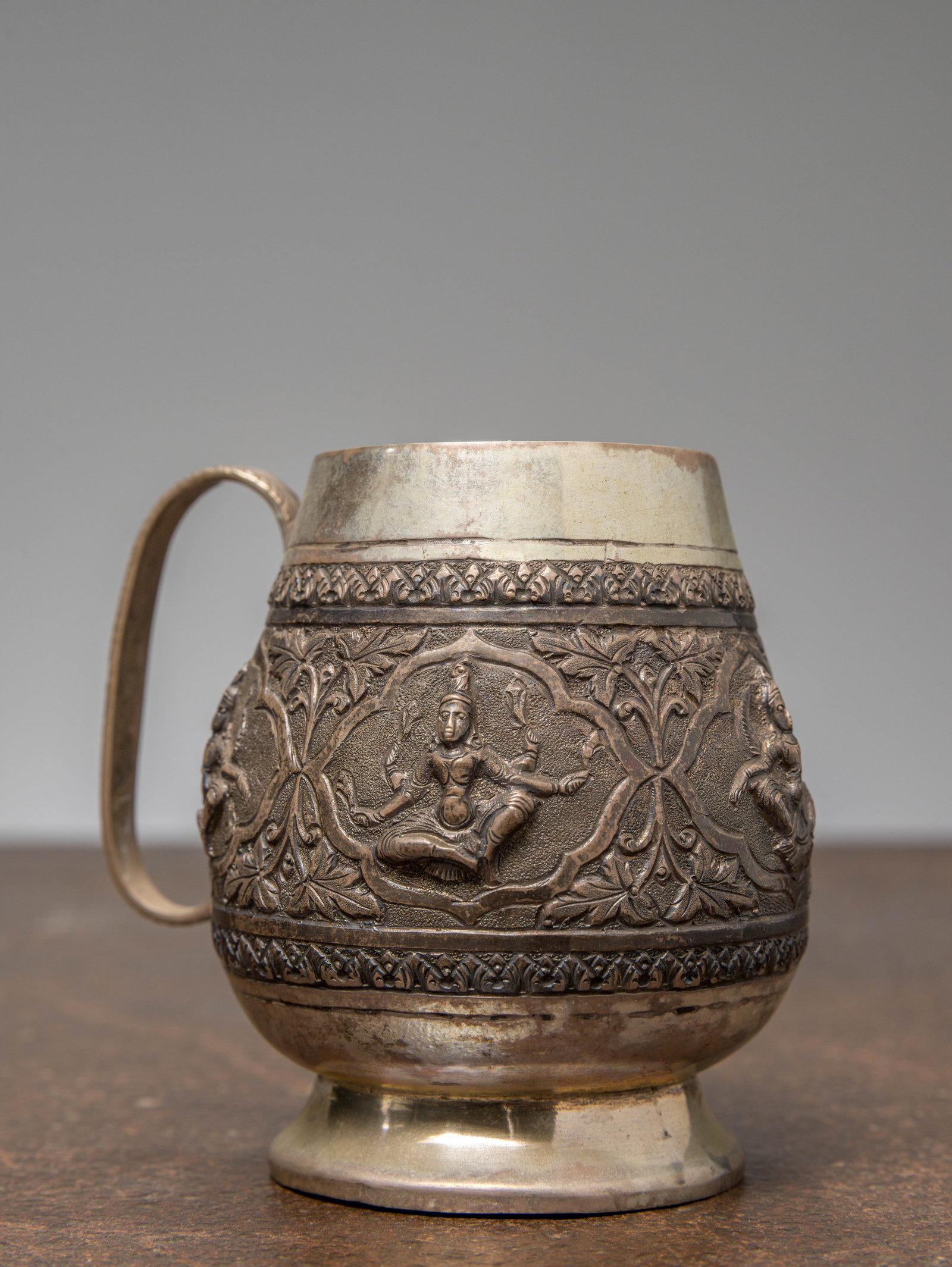 A SILVER CAST VESSEL DEPICTING HINDU GODESS, INDIA, 18TH CENTURY (1 of 5)