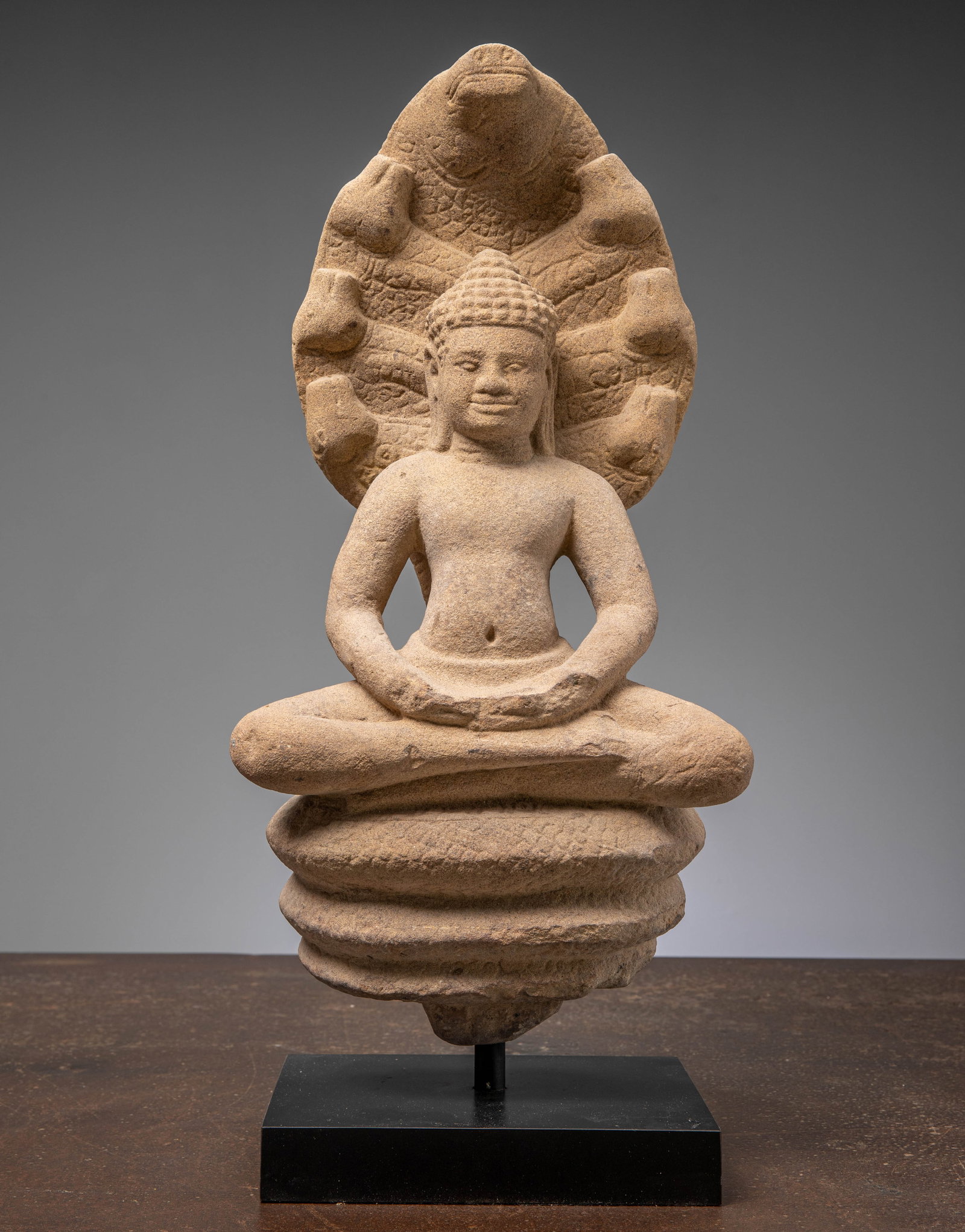 A SANDSTONE NAGA BUDDHA, 11TH CENTURY, BAPHUAN PERIOD (1 of 6)