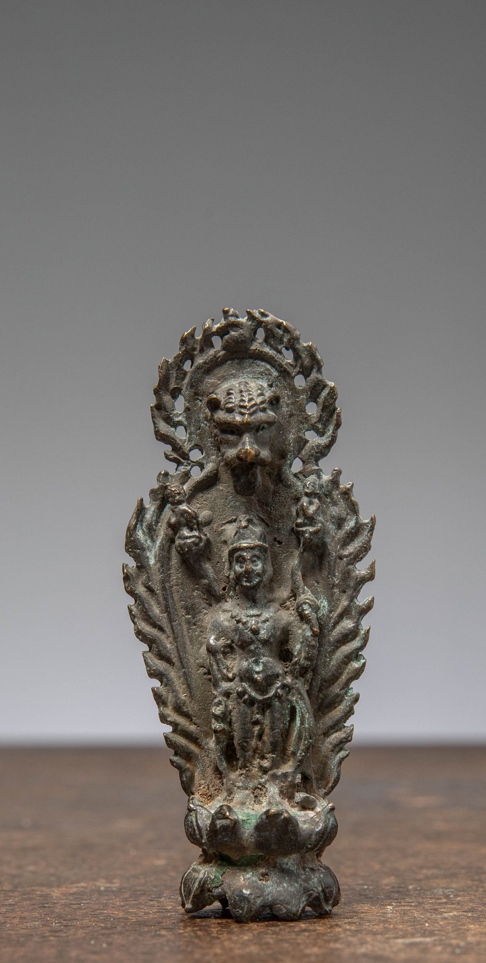 A SMALL BRONZE FIGURE OF A GUARDIAN DEITY, CHINA MNG DYNASTY (1 of 6)