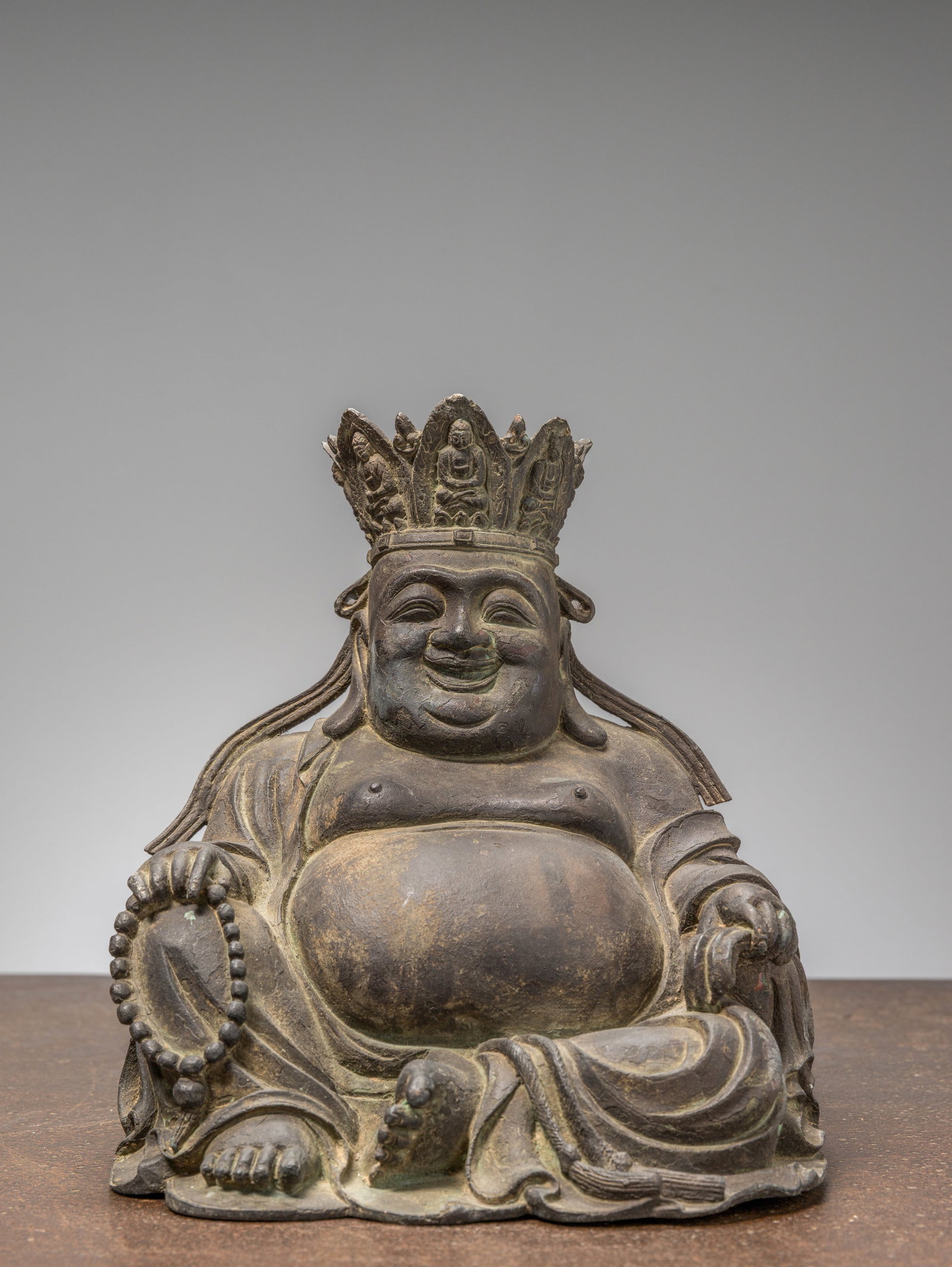 A SEATED BRONZE FIGURE OF BUDAI (LAUGHING BUDDHA), CHINA, 18TH CENTURY (1 of 7)