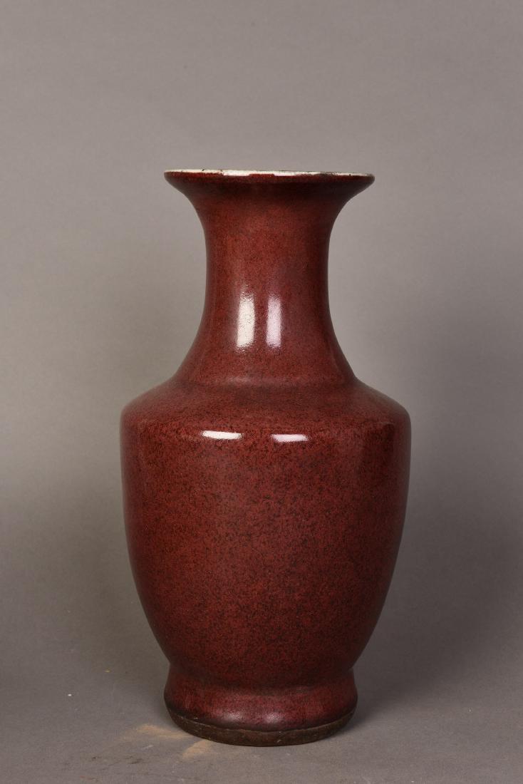 A CHINESE RED-GLAZED PORCELAIN VASE (1 of 4)