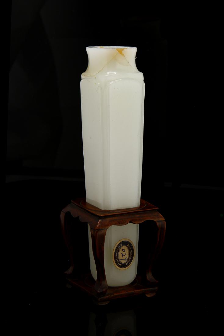 Finely Carved White Jade Incense Vase: Of square section rising to a elegantly tapered body to a waisted tubular neck and a flared mouth rim, the sides carved with grooved corner, the smoothly polished jade of milky white color with slight