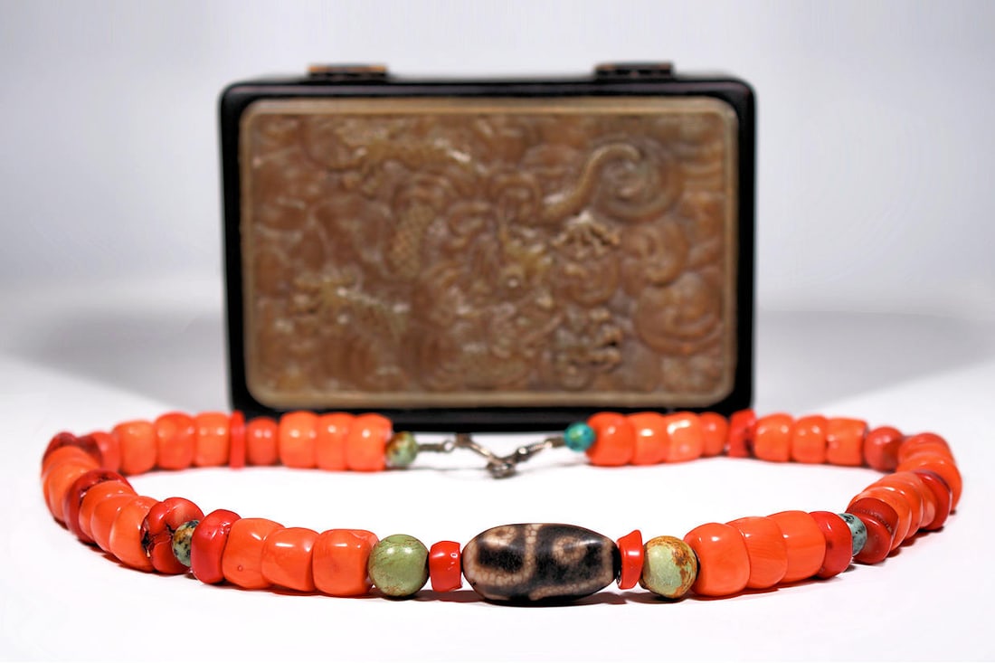 ANTIQUE TIBETAN 6 EYE DZI BEAD CORAL TURQUOISE NECKLACE / BUDDHIST MALA BEADS: Antique Buddhist Dzi Bead, Coral and Turquoise beaded neckalce.The item is in great condition and measures in length total of 27" Inches, weighing a bit over 8.3Oz .Beads measure 1-3/8" Inch for the l