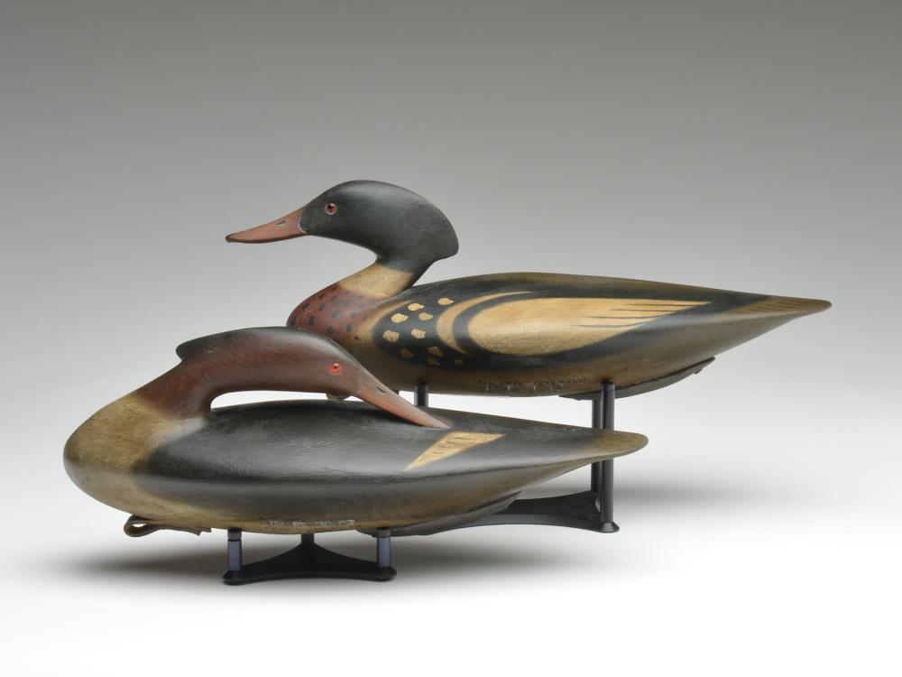 Pair of mergansers, Pete Peterson, Cape Charles,: Pair of mergansers, Pete Peterson, Cape Charles, Virginia. Signed, branded, and dated 2004. Hen is in preening pose with bill slightly buried in feathers. Drake is 17.5" long. Notes: Decoy