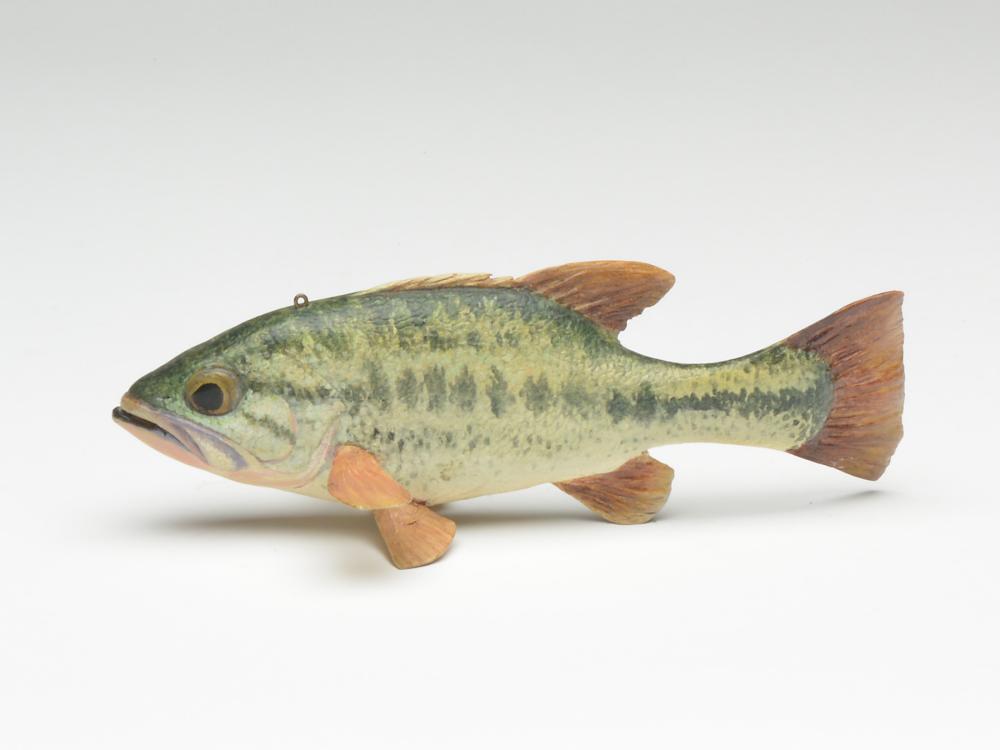 Large mouth bass, Jim Foote, Detroit, Michigan.: Large mouth bass, Jim Foote, Detroit, Michigan. Signed and dated 1990 in underside. Painted eyes with wooden fins. Detailed scale carving. 7.5" long. Provenance: Dick and Diane Walters collection. Not