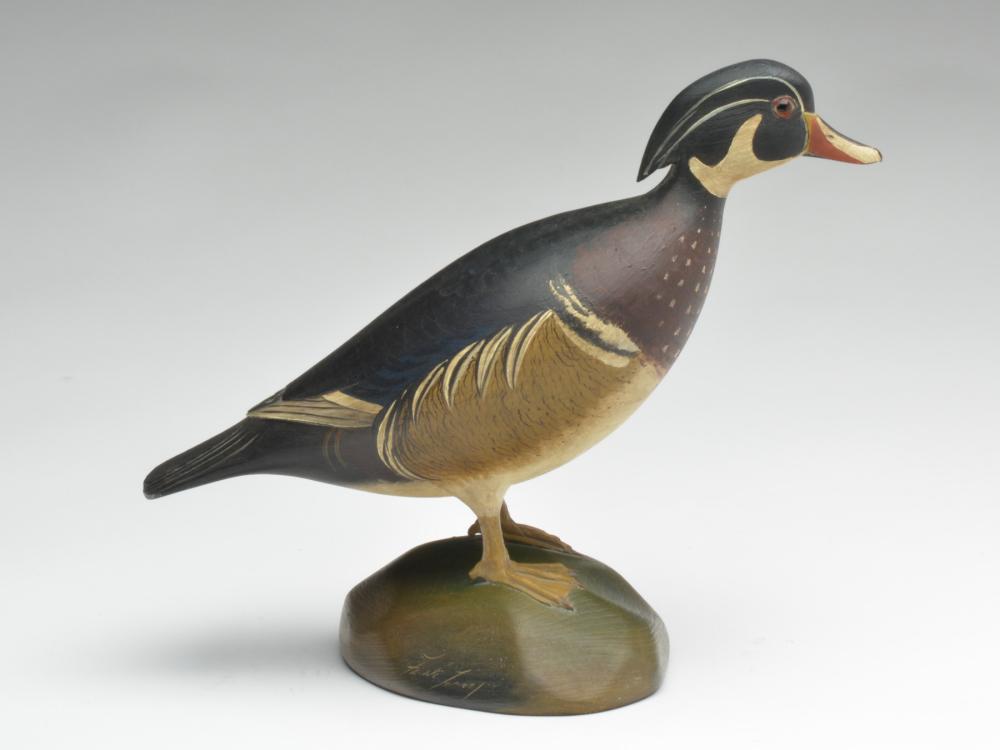 Standing wood duck, Frank Finney, Cape Charles,: Standing wood duck, Frank Finney, Cape Charles, Virginia. Standing wood duck, Frank Finney, Cape Charles, Virginia. Relief wing and tail feather carving. 'F' carved into underside of base. Measures 13