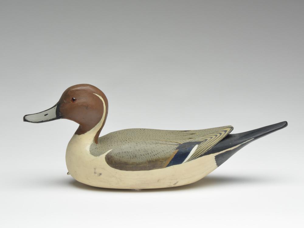 Pintail drake, Reme Roussell, Raceland, Louisiana.: Pintail drake, Reme Roussell, Raceland, Louisiana. Pintail drake, Reme Roussell, Raceland, Louisiana. 16.75" long. Raised wingtip carving and glass eyes. Literature:"Louisiana Lures and Legends," Bria