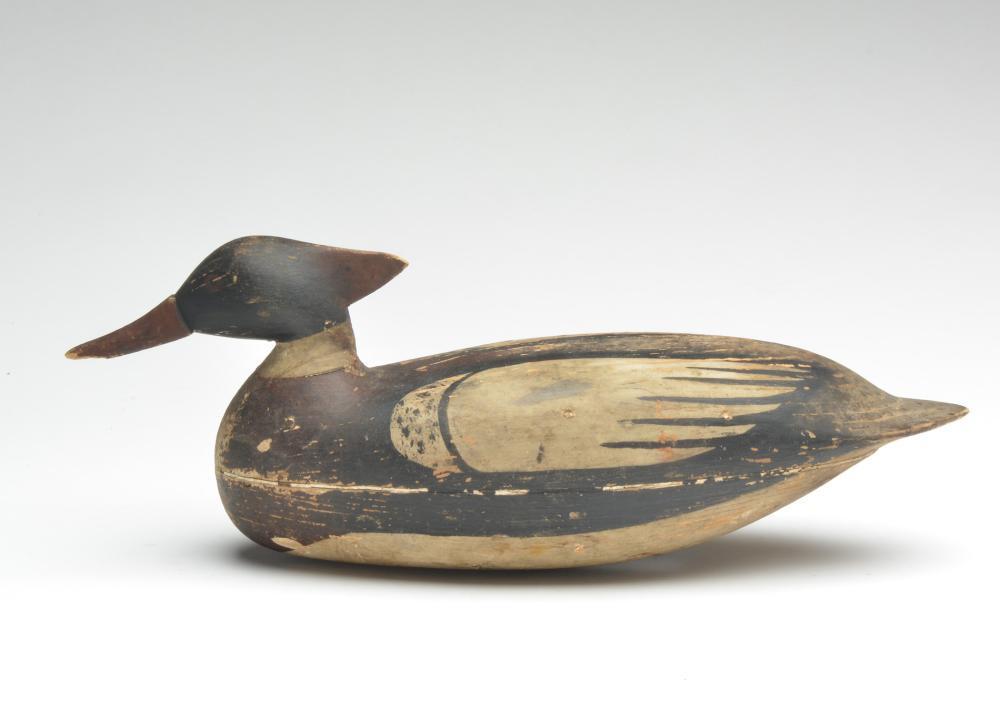 Extremely rare Merganser Drake, Mark Kears, North: Extremely rare Merganser Drake, Mark Kears, North Field, New Jersey 16 1/2" Long with inset rectangular weight. Condition Original paint with minor wear; moderate wear on center of back. Small chip mi