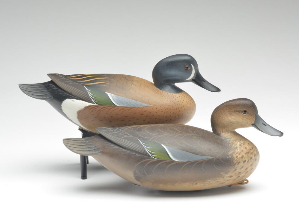 Pair of blue wing teal, George Strunk, Glendora, New: Pair of blue wing teal, George Strunk, Glendora, New Jersey. Hollow carved with slightly turned heads and raised 'V' wing tip carving. Relief carved tail feathers. 'GS' stamped into lead weights. Cond
