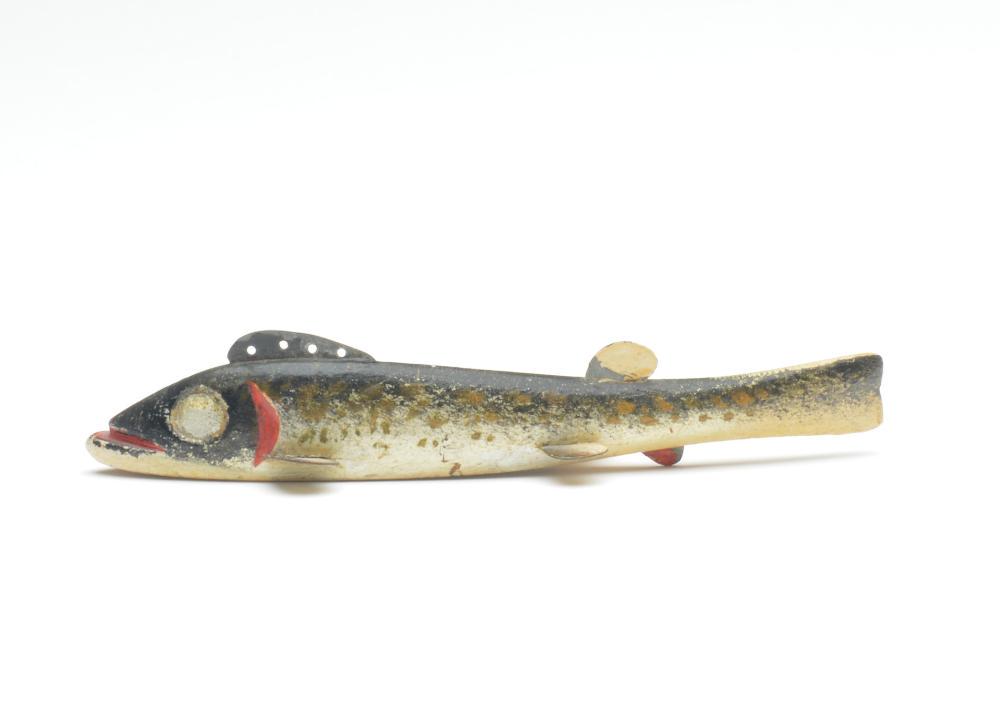 Fish decoy, Oscar Peterson, Cadillac, Michigan, 1st: Fish decoy, Oscar Peterson, Cadillac, Michigan, 1st quarter 20th century. Carved eye model. 7" long x .75" wide x 1" tall. Condition Original paint protected by a coat of varnish; some loss at metal f