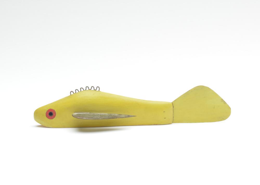 Fish decoy, Leroy Howell , Hinkley, Minnesota.: Fish decoy, Leroy Howell , Hinkley, Minnesota. Rare yellow color with red eye. 8" long. Condition Slightly tarnished fins otherwise excellent and original.