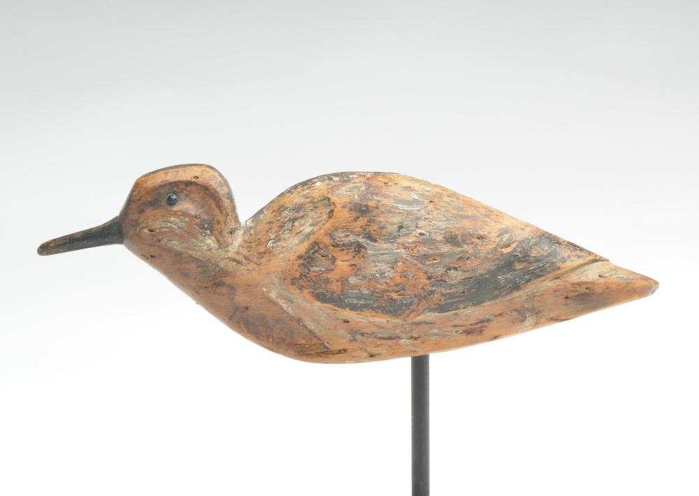 Running black bellied plover, Wendell Squire, Hampton: Running black bellied plover, Wendell Squire, Hampton Bays, New York, mid 19th century. A large decoy, approximately 12.25" long. Shoe button eyes and relief wing carving. Condition Worn original pain