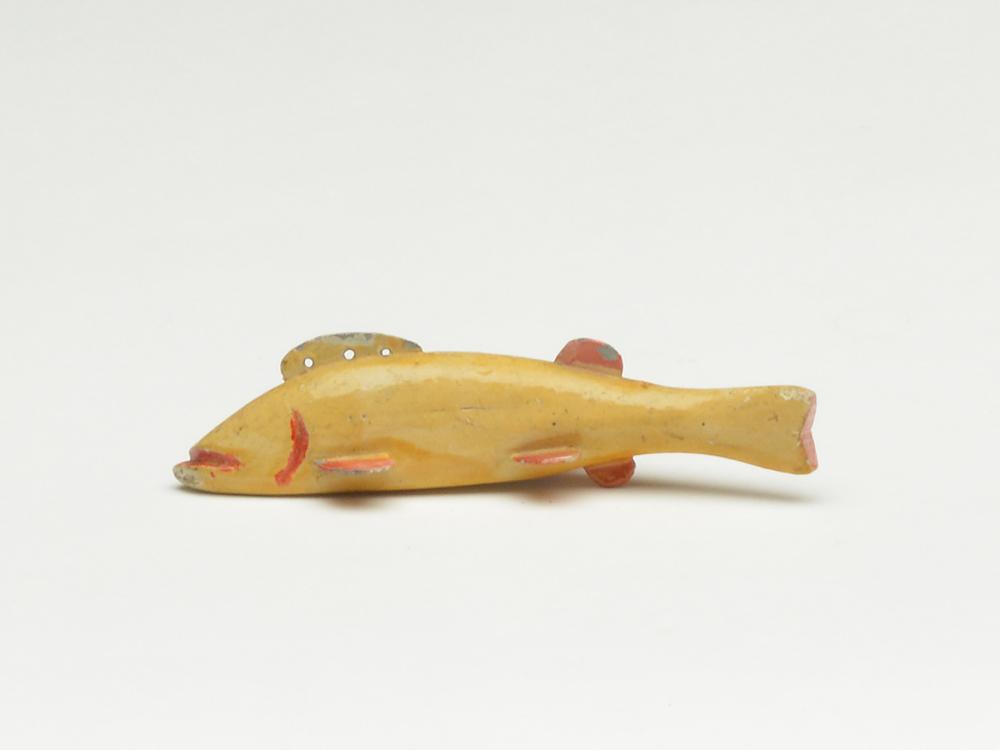 Albino trout fish decoy, Oscar Peterson, Cadillac,: Albino trout fish decoy, Oscar Peterson, Cadillac, Michigan, 2nd quarter 20th century. Possibly the smallest Peterson fish decoy on record. 3.5" long x .5" tall x .5" wide. Provenance: Michaan collect