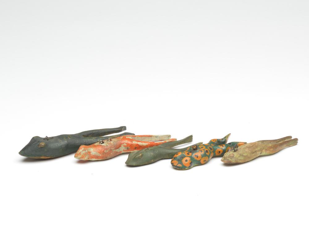 Group of five vintage frog decoys, probably all from: Group of five vintage frog decoys, probably all from Michigan. All have carved and separated legs to simulate a swimming motion. Longest measures 5". Provenance: Michaan collection. Literature: "Ameri