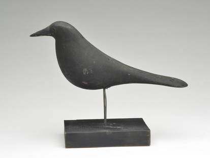 Working crow decoy, Charles Perdew, Henry, Illinois,: Working crow decoy, Charles Perdew, Henry, Illinois, circa 1930. Applied metal legs, secured with staples. Glass eyes. Mounted on base. 16" long. Provenance: Formerly in collection of Otto Meyer. Note