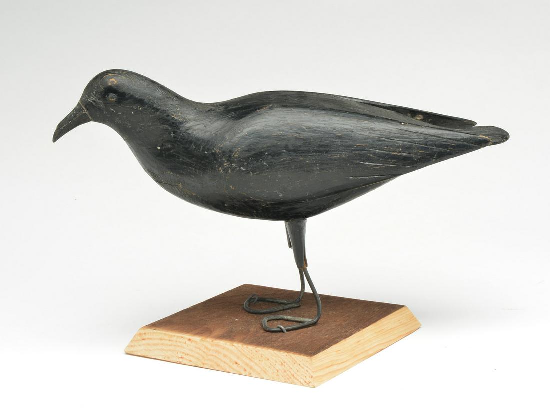 Possibly unique crow, Gus Wilson, South Portland,: Possibly unique crow, Gus Wilson, South Portland, Maine. Split wingtips with drop tail, all of which are carved. Wilson's typical metal feet. 10" tall x 15" long. Provenance Dr. John Dinan collection.