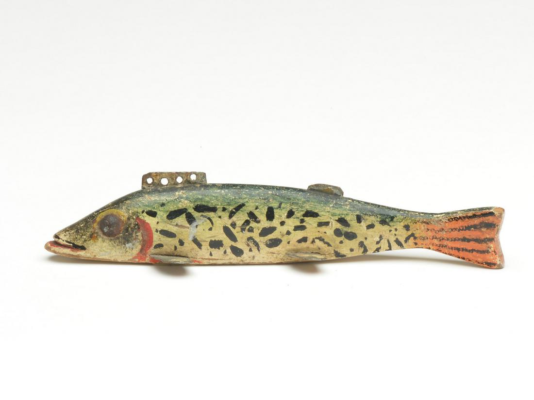 Early musky fish decoy, Oscar Peterson, Cadillac,: Early musky fish decoy, Oscar Peterson, Cadillac, Michigan, 1st quarter 20th century. Tack eyes. 6.5" long x 1" tall x .75" wide. Provenance Steven Michaan collection. Literature "Michigan Master Carv