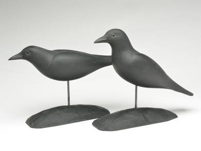 Pair of crows, Harold Haertel, Dundee, Illinois.: Pair of crows, Harold Haertel, Dundee, Illinois. Inscribed on underside, "For Harold Corbin, 1969". Both have glass eyes. Matching carved bases. 17" long x 12" tall. Provenance Otto Meyer collection.