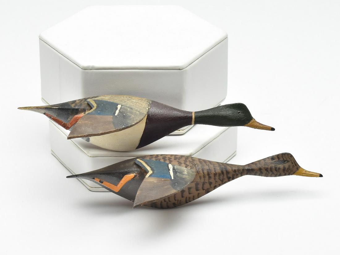 Pair of 1/3 size flying mallards, Roy Conklin, Alexandria Bay, New York.: Pair of 1/3 size flying mallards, Roy Conklin, Alexandria Bay, New York. Applied wooden legs and wings. Scratch feather paint detail on drake. Measures 7.75" long.