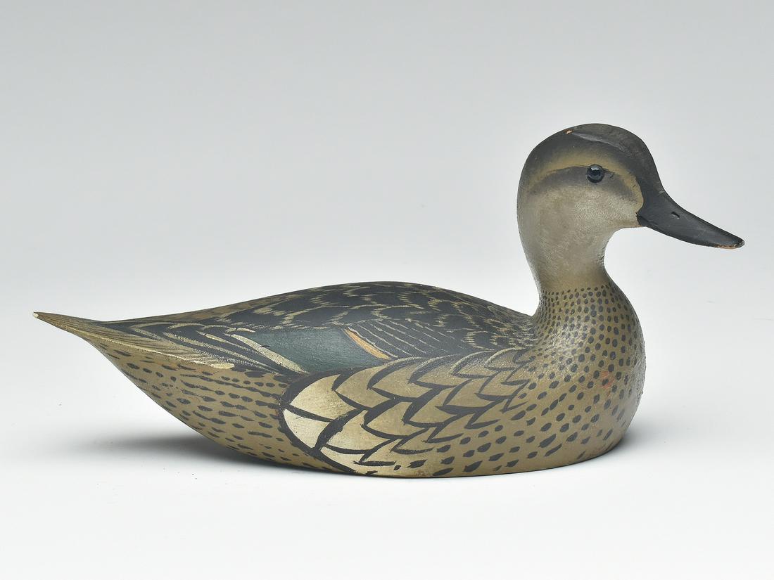 Greenwing teal hen, Ward Brothers, Crisfield, Maryland.: Greenwing teal hen, Ward Brothers, Crisfield, Maryland. Classic 1936 style with slightly turned head and delicate bill carving. Maker's ink stamp on the underside. Measures 12.25" long. Notes: Decoy