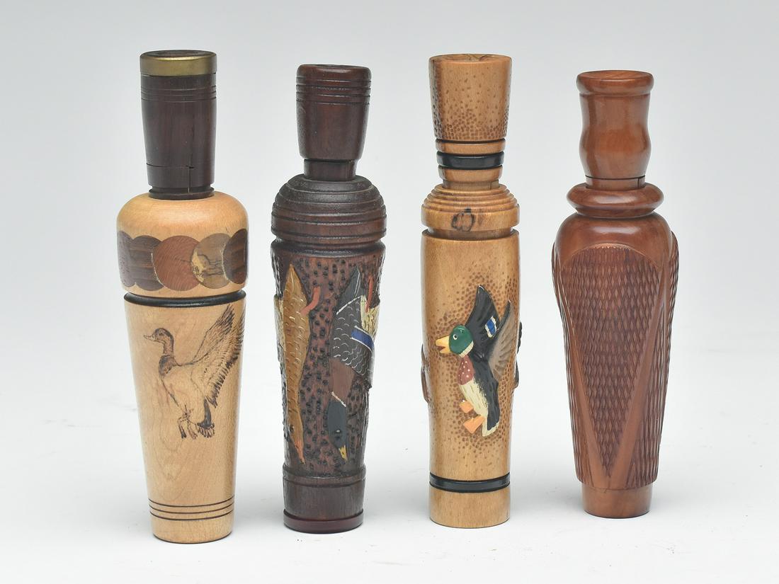 Four contemporary duck calls. (1 of 3)