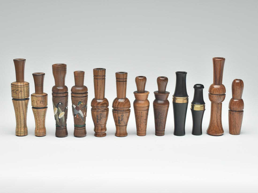 Six duck and goose call sets by various makers.: Six duck and goose call sets by various makers. By Bill Hatch, Ken Martin, Art Beauchamp, John McKean, Skip Campbell, both are dated 98 on brass collar, and set by Wendell Carlson. Provenance: Kirby R